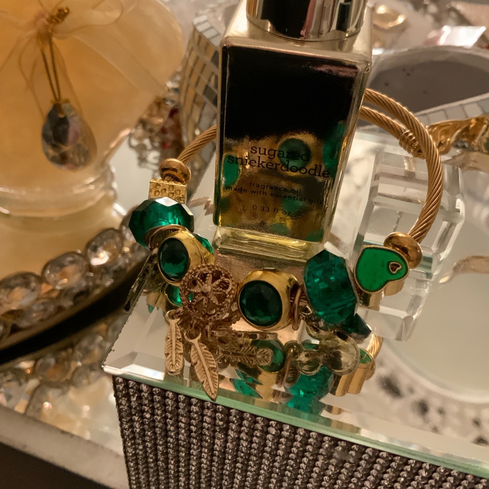 Gold Charm Bracelet with Emerald Green Accents